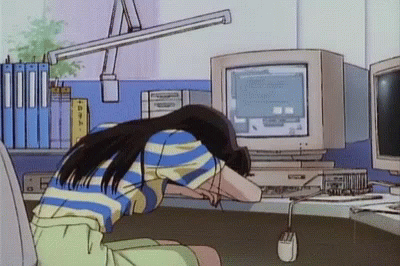 A girl sleeping at her desk, mouse dangling and CRT monitor buzzing away.